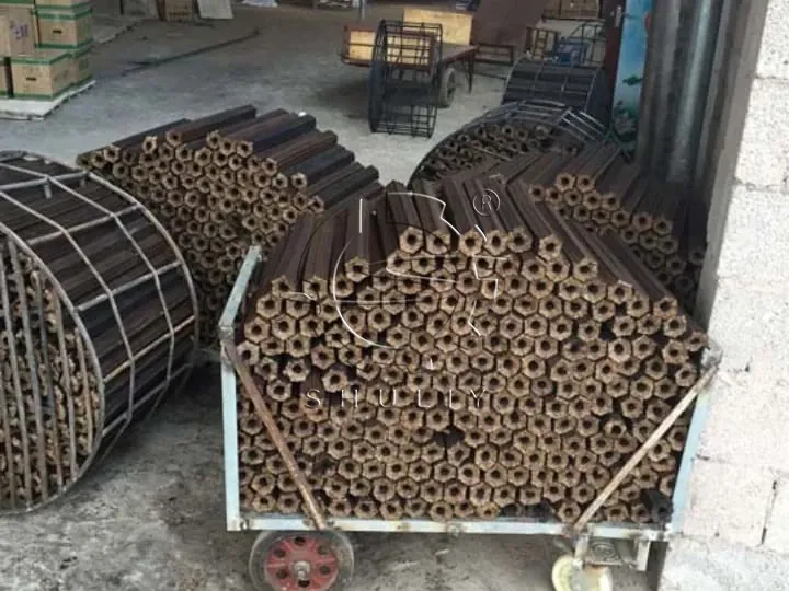 Sawdust Briquette Making Machine 11 Pini kay briquette produced by sawdust briquette maker